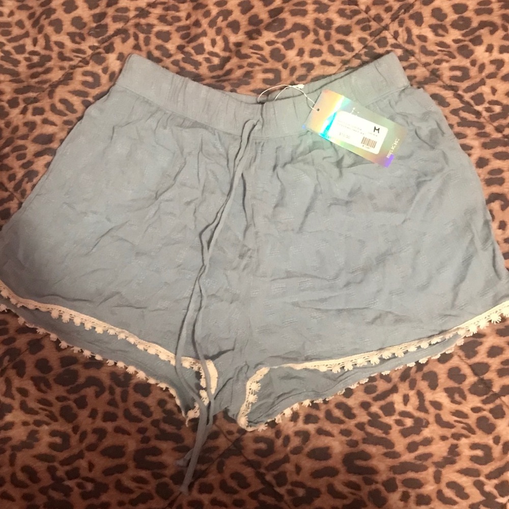 brand new light blue lace flowy shorts .